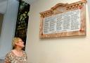 Liz Cope,from Savoy family history group surveys a memorial to Netherton war heroes at St Andrews Church, Netherton. 261406LA