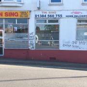 The graffiti covered Tin Sing takeaway in Quarry Bank High Street