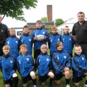 Brockmoor and Pensnett PCSO Jeff Evenet and Sergeant Cliff Tomkinson with the tag rugby team.