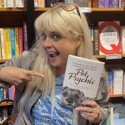 Beth Lee-Crowther with her book Everything You Need to Know to Become a Pet Psychic