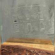 The Crooked House artwork by glass engraver Thomas Southall