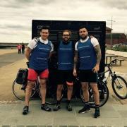 Andrew Baxter, Rikki Theodosi and Scott Moore at the end of their coast-to-coast cycling challenge in aid of Mary Stevens Hospice