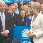Prime Minister Theresa May congratulates Councillor Patrick Harley after a night of Conservative election success