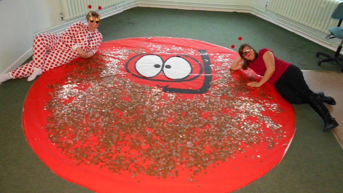 Teachers and pupils at Sledmere Primary School chucked their change into the big red nose.