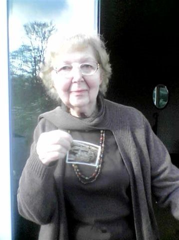 Mrs Constance Routh holding photo of the tiger den incident 