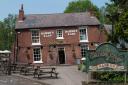 Undated photo by Nick Maslen/Alamy Stock Photo of The Crooked House pub near Dudley.