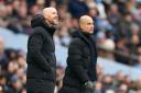Manchester United manager Erik ten Hag (left) and Manchester City manager Pep Guardiola (Mike Egerton/PA)