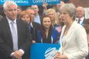 Prime Minister Theresa May congratulates Councillor Patrick Harley after a night of Conservative election success