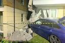 Car crashes into block of flats in Dudley. Photo: West Midlands Fire Service