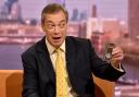 Nigel Farage holding up the 50p Brexit coin  on The Andrew Marr Show in 2020. Image/PA.
