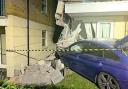 Car crashes into block of flats in Dudley. Photo: West Midlands Fire Service