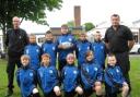 Brockmoor and Pensnett PCSO Jeff Evenet and Sergeant Cliff Tomkinson with the tag rugby team.