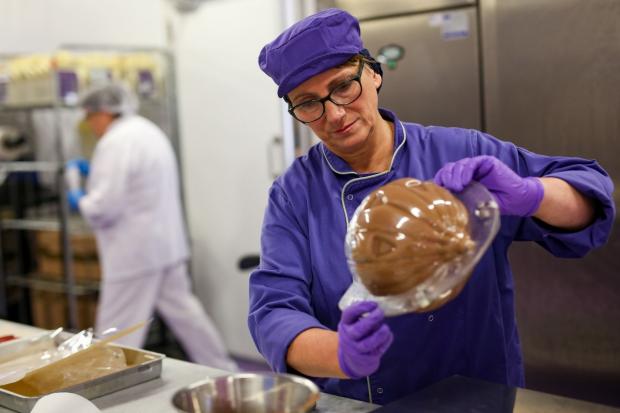 Dudley News: Cadbury World chocolatier, Donna Oluban, creates a chocolate pumpkin (Jacob King/PA)
