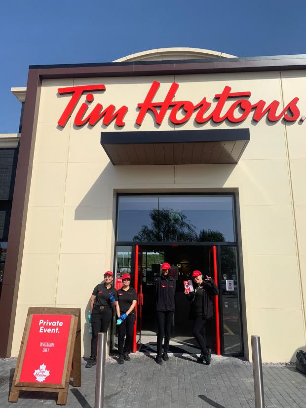 Dudley News: Staff outside Tim Hortons. 