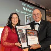 Phil Harris is presented with the Visitor Attraction Volunteer of the Year Award by Stephanie Preece, editor of the Dudley News