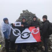 Trekkers at the summit of Ben Nevis in 2022. L-r - Cllr Simon Phipps, Alderman Steve Waltho, Darren Smith and Cllr Peter Drake.