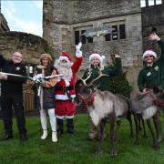 Santa and his reindeer at Dudley Zoo and Castle with singer and actress Zoe Birkett. Pic - Dudley Zoo and Castle