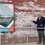 Cllr Shaukat Ali outside the Duncan Edwards Leisure Centre in Dudley where the brickwork has turned white