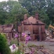 Video images show demolition of The Crooked House underway, shared by an anonymous poster on Facebook