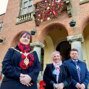Councillor Andrea Goddard, Mayor of Dudley, Rose Cook-Monk, poppy appeal organiser and Councillor James Clinton, Mayoral consort.