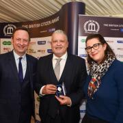 Awards host Matt Allwright, left, David Vickery, centre, and Stephanie Wood - One Stop Stores, right.