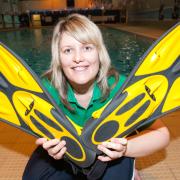 Recreation assistant Gemma Staples teaches the new fins and paddles class